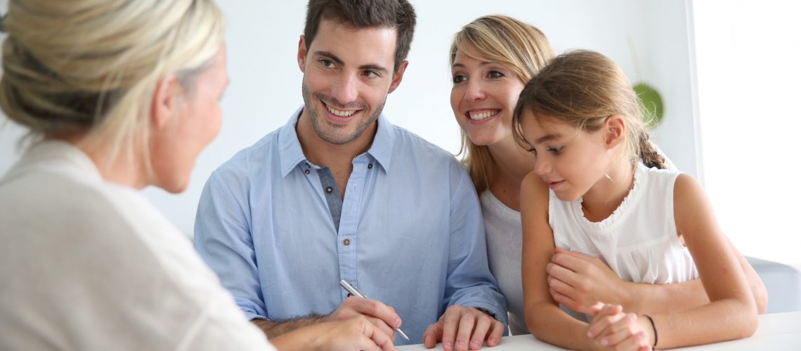 Family meeting real-estate agent for house investment